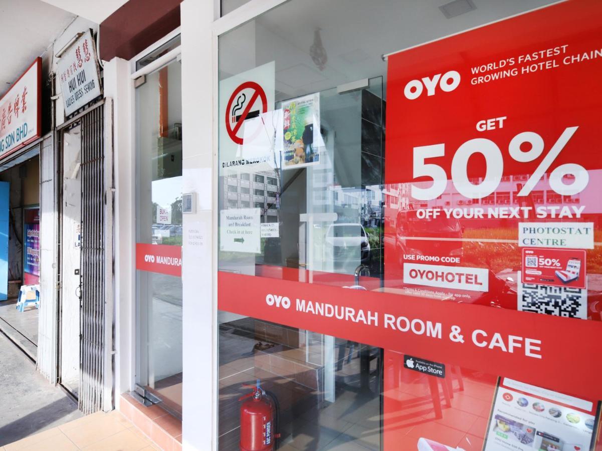 OYO 836 Mandurah Room&Cafe Kuching Bagian luar foto